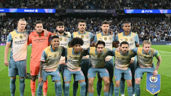 Manchester City players pose for a team photo ahead of the UEFA Champions League, league phase football match between Manchester City and Inter Milan at the Etihad stadium, in Manchester, north-west England, on September 18, 2024 (Photo by Oli SCARFF / AFP)