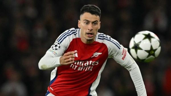 Arsenal's Brazilian midfielder #11 Gabriel Martinelli chases the ball during the UEFA Champions League football match between Arsenal and Paris Saint-Germain (PSG) at the Emirates Stadium in north London on October 1, 2024. (Photo by Glyn KIRK / AFP)
