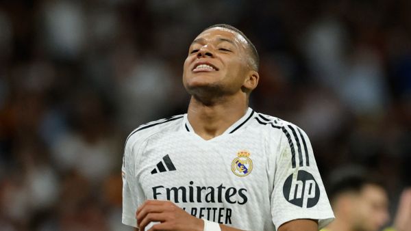Real Madrid's French forward #09 Kylian Mbappe reacts during the Spanish league football match between Real Madrid CF and Villarreal CF at the Santiago Bernabeu stadium in Madrid on October 5, 2024. (Photo by OSCAR DEL POZO / AFP)
