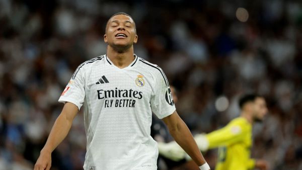 Real Madrid's French forward #09 Kylian Mbappe reacts during the Spanish league football match between Real Madrid CF and Villarreal CF at the Santiago Bernabeu stadium in Madrid on October 5, 2024. (Photo by OSCAR DEL POZO / AFP)