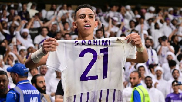 Ain's Moroccan midfielder #21 Soufiane Rahimi celebrates scoring his team's third goal during the second leg of the AFC Champions League Final between UAE's Al Ain and Japan's Yokohama F. Marinos at the Hazza Bin Zayed Stadium in Al-Ain on May 25, 2024. (Photo by Giuseppe CACACE / AFP)