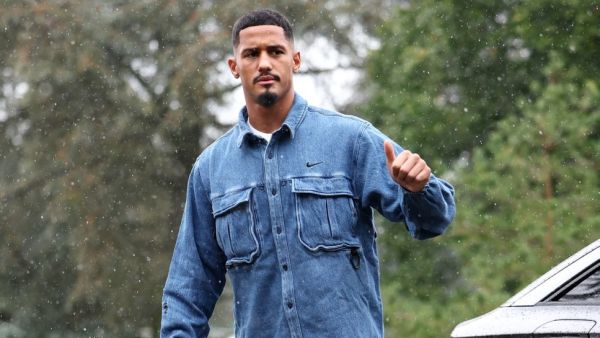 France's national football team's defender William Saliba gestures as he arrives to take part in the team's preparation for upcoming UEFA Nations League match qualifying matches in Clairefontaine-en-Yvelines on October 7, 2024. (Photo by FRANCK FIFE / AFP)