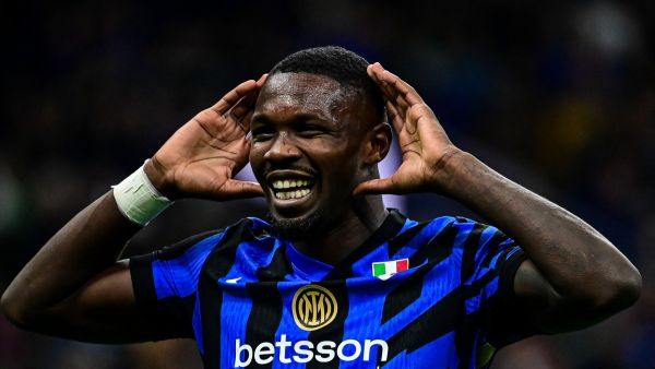 Inter Milan's French forward #09 Marcus Thuram celebrates after scoring his team's third goal during the Italian Serie A football match between Inter Milan and Torino at San Siro Stadium in Milan on October 5, 2024. (Photo by Piero CRUCIATTI / AFP)