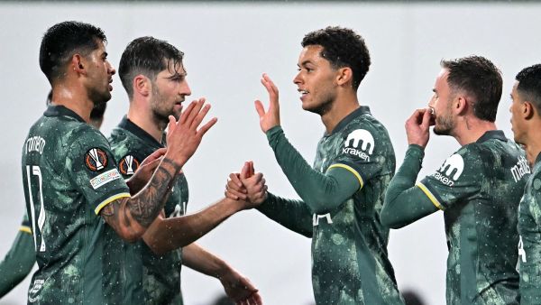 Tottenham Hotspur's Welsh striker #22 Brennan Johnson (C) celebrates with teammates after scoring the 2-0 goal during the UEFA Europa League football match between Ferencvarosi TC and Tottenham Hotspur in Budapest on October 3, 2024. (Photo by Attila KISBENEDEK / AFP)
