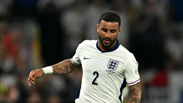 England's defender #02 Kyle Walker runs with the ball during the UEFA Euro 2024 semi-final football match between the Netherlands and England at the BVB Stadion in Dortmund on July 10, 2024. (Photo by OZAN KOSE / AFP)