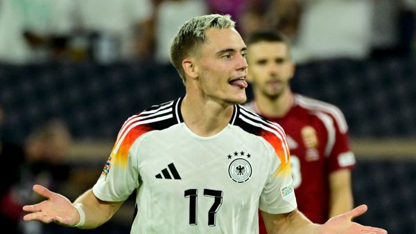 Germany's midfielder #17 Florian Wirtz celebrates after scoring the 3-0 goal during the League A Group A3 football match of the UEFA Nations League between Germany and Hungary in in Duesseldorf, western Germany, on September 7, 2024. (Photo by John MACDOUGALL / AFP)
