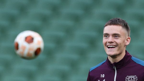 Bayer Leverkusen's German midfielder #10 Florian Wirtz eyes the ball as he takes part in a training session at the Dublin Arena stadium, in Dublin, on May 21, 2024, on the eve of their UEFA Europa League final football match against Atalanta. (Photo by Adrian DENNIS / AFP)