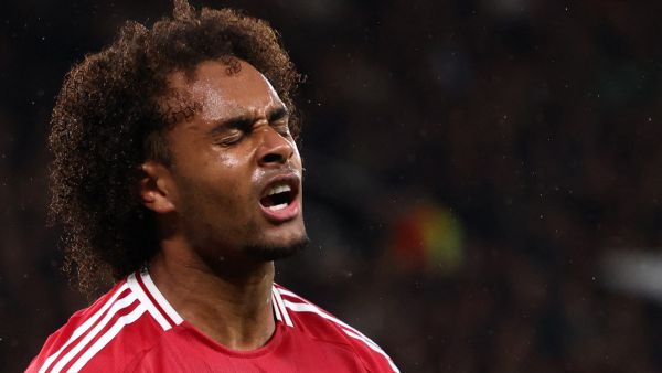 Manchester United's Dutch striker #11 Joshua Zirkzee reacts after missing a chance on goal during the UEFA Europa league stage football match between Manchester United and FC Twente at Old Trafford stadium in Manchester, north west England, on September 25, 2024. (Photo by Darren Staples / AFP)