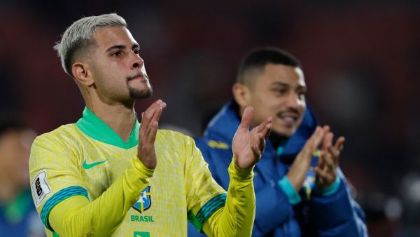 Brazil's midfielder Bruno Guimaraes celebrates after winning the 2026 FIFA World Cup South American qualifiers football match between Chile and Brazil, at the National stadium in Santiago, on October 10, 2024. (Photo by Javier TORRES / AFP)