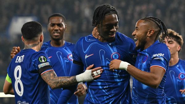 Chelsea's French defender #02 Axel Disasi (2R) celebrates scoring the team's third goal with Chelsea's French striker #18 Christopher Nkunku during the UEFA Europa Conference League, League Stage football match between Chelsea and FC Noah at Stamford Bridge in London on November 7, 2024. (Photo by Glyn KIRK / AFP)