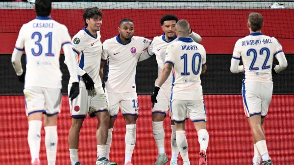 Chelsea's French midfielder #18 Christopher Nkunku (3rdR) celebrates with teammates after he scored the opening goal during the UEFA Conference League football match between 1 FC Heidenheim and Chelsea FC in Heidenheim, Germany on November 28, 2024. (Photo by THOMAS KIENZLE / AFP)