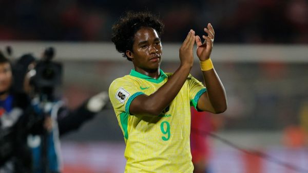 Brazil's forward Endrick celebrates after winning the 2026 FIFA World Cup South American qualifiers football match between Chile and Brazil, at the National stadium in Santiago, on October 10, 2024. (Photo by Javier TORRES / AFP)