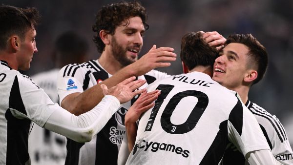 Juventus Turkish forward #10 Kenan Yildiz celebrates with Juventus’ Portuguese forward #07 Francisco Conceicao after scoring a goal during the Italian Serie A football match between Juventus and Torino at the "Allianz Stadium" in Turin, on November 9, 2024. (Photo by MARCO BERTORELLO / AFP)