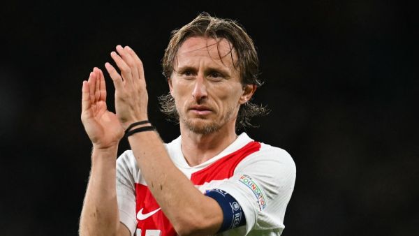 Croatia's midfielder #10 Luka Modric applauds at the end of the UEFA Nations League, League A, Group 1 football match between Scotland and Croatia at Hampden Park Stadium, in Glasgow, on November 15, 2024. Scotland wins 1 - 0 against Croatia. (Photo by ANDY BUCHANAN / AFP)
