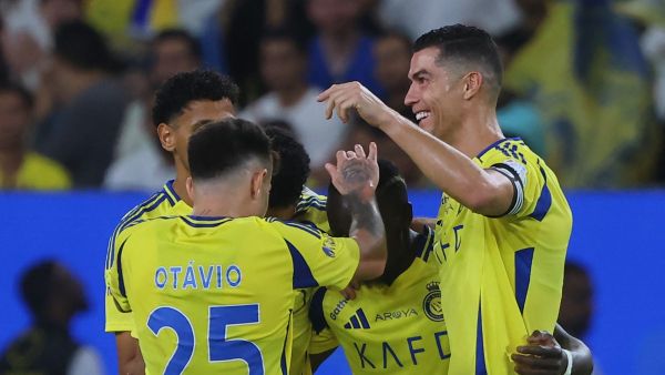 Nassr's Portuguese forward #07 Cristiano Ronaldo celebrates with teammates after their third goal in the Saudi Pro League football match between Al-Nassr and Al-Orobah at Al-Awwal Park in Riyadh on October 5, 2024. (Photo by Fayez NURELDINE / AFP)