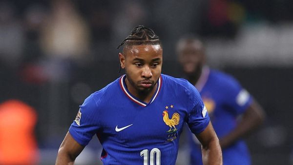 France's forward #10 Christopher Nkunku controls the ball during attends the UEFA Nations League, League A Group A2 football match between France and Israel at the Stade de France stadium in Saint-Denis, in the northern outskirts of Paris, on November 14, 2024. (Photo by FRANCK FIFE / AFP)