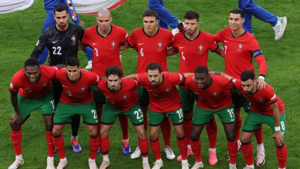 Portugal's players pose for a team picture before the start of the UEFA Euro 2024 quarter-final football match between Portugal and France at the Volksparkstadion in Hamburg on July 5, 2024. (Photo by Ronny HARTMANN / AFP)