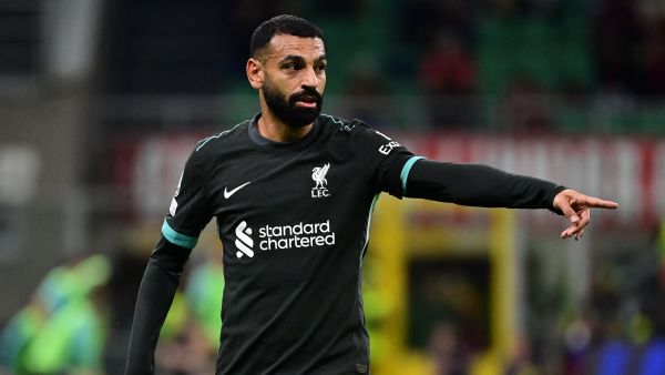Liverpool's Egyptian forward #11 Mohamed Salah gestures during the UEFA Champions League 1st round day 1 football match between AC Milan and Liverpool FC at the San Siro stadium in Milan on September 17, 2024. (Photo by PIERO CRUCIATTI / AFP)
