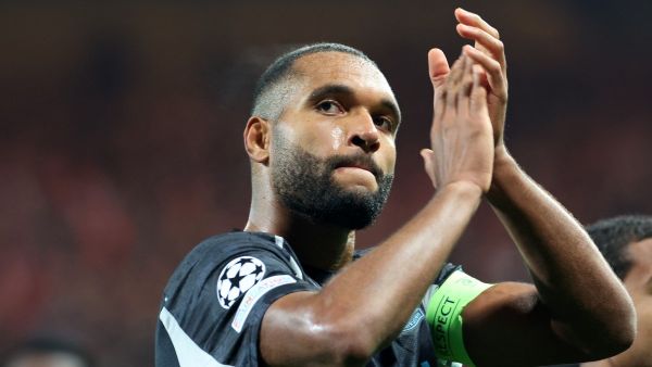 Bayer Leverkusen's German defender #04 Jonathan Tah acknowledges the fans at the end of the UEFA Champions League 1st round day 3 football match between Brest (FRA) and Bayer Leverkusen (GER) at the Stade de Roudourou in Guingamp, northern France, on October 23, 2024. (Photo by FRED TANNEAU / AFP)