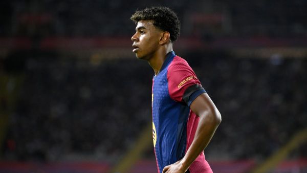 Barcelona's Spanish forward #19 Lamine Yamal stands on the pitch during the Spanish league football match between FC Barcelona and Sevilla FC at the Estadi Olimpic Lluis Companys in Barcelona on October 20, 2024. (Photo by Josep LAGO / AFP)