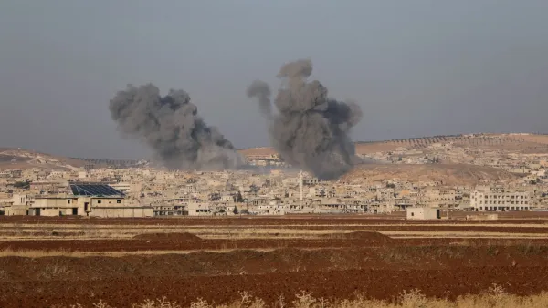 Smoke billows the the Syrian town of Suran, between Aleppo and Hama, on December 3, 2024.
