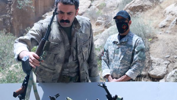 “Flames of peace”: PKK fighters burn weapons in powerful farewell to war