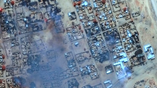 his handout image courtesy of Maxar Technologies released on April 17, 2025, shows smoke billowing and burned buildings in the Zamzam camp near the besieged Darfur city of El-Fasher. AFP 24 killed, 55 injured in RSF artillery shelling on El Fasher