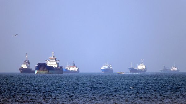 In this picture obtained from Iran's ISNA news agency on May 4, 2026, vessels are pictured anchored in the Strait of Hormuz off Bandar Abbas in southern Iran. Photo by AMIRHOSSEIN KHORGOOEI / ISNA / AFP