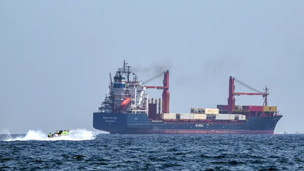 Cargo ship hit near Strait of Hormuz as Iran-Oman shipping dispute escalates