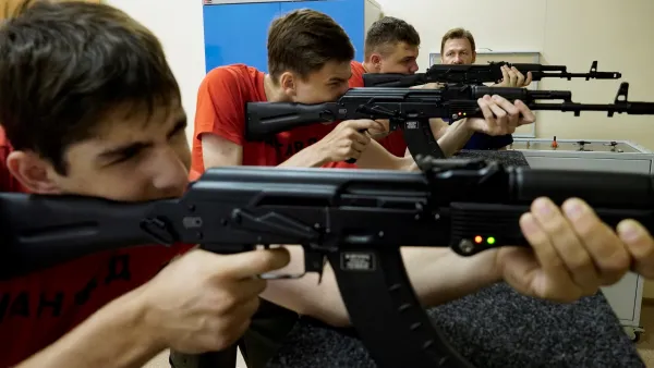 Russian teenagers shooting AKs at school training