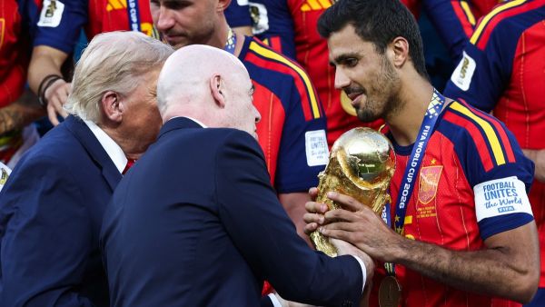 FIFA President Infantino and US President Trump hand World Cup trophy to Spanish player Rodri