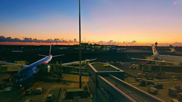 Rome,Italy-Sep.25th 2025: Leonardo da Vinci Rome Fiumicino Airport apron at sunset with airplanes