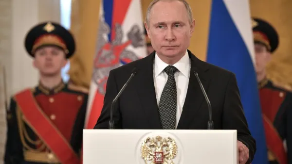 Russian President Vladimir Putin (C) delivers a speech during a ceremony to present national award and to mark the Defender of the Fatherland Day at the Kremlin in Moscow on Feb. 23, 2018. 
(Alexey NIKOLSKY / Sputnik / AFP)