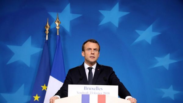 (FILES) French President Emmanuel Macron gestures as he addresses a press conference at the end of the European Council summit in Brussels on Feb. 23, 2018. 
(Ludovic MARIN / AFP)