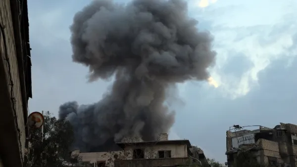 Smoke billows following a regime air strike on the rebel-held town of Haza, in the besieged Eastern Ghouta region on the outskirts of the capital Damascus, on Feb. 23, 2018. Syrian regime air strikes and artillery fire hit the rebel-held enclave of Eastern Ghouta for a sixth straight day killing 32 civilians, as the world struggled to reach a deal to stop the carnage.
(AMER ALMOHIBANY / AFP)