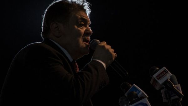 El-Sayed El-Badawi, head of Egypt's Al-Wafd Party, speaks during a rally for supporters of President Abdel Fattah al-Sisi in a neighbourhood in Cairo on Mar. 9, 2018. 
(IBRAHIM EZZAT / AFP)