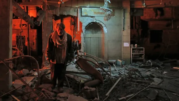 A man walks inside a mosque after an air strike in Douma, Eastern Ghouta, on Mar.19, 2018. The regime did not completely release the pressure on Douma however, the latest strikes killing at least 13 people overnight, the Syrian Observatory for Human Rights said. (HASAN MOHAMED / AFP)