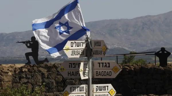 An Israeli flag is seen placed on Mount Bental in the Israeli-annexed Golan Heights on May 10, 2018. Israel's army said today it had carried out widespread raids against Iranian targets in Syria overnight after rocket fire towards its forces it blamed on Iran, marking a sharp escalation between the two enemies. Israel carried out the raids after it said around 20 rockets, either Fajr or Grad type, were fired from Syria at its forces in the occupied Golan Heights at around midnight.
(JALAA MAREY / AFP)