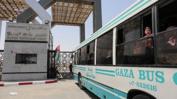 Palestinians wait to travel to Egypt through the Rafah border crossing, in the southern Gaza Strip, on May 18, 2018. Egyptian President Abdel Fattah al-Sisi has made a rare decision to open the Rafah crossing with Gaza for a month, allowing Palestinians to cross during the holy period of Ramadan. The decision to keep the crossing open was taken "to alleviate the suffering" of residents in the Palestinian enclave, Sisi said on Facebook late on May 17. (SAID KHATIB / AFP)