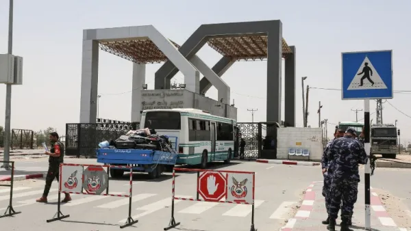 Palestinians wait to travel to Egypt through the Rafah border crossing, in the southern Gaza Strip, on May 18, 2018. Egyptian President Abdel Fattah al-Sisi has made a rare decision to open the Rafah crossing with Gaza for a month, allowing Palestinians to cross during the holy period of Ramadan. The decision to keep the crossing open was taken "to alleviate the suffering" of residents in the Palestinian enclave, Sisi said on Facebook late on May 17. (SAID KHATIB / AFP)