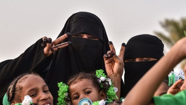 People arrive to attend a show as part of celebrations of the 88th Saudi National Day at the King Fahad stadium on September 23, 2018 in Riyadh. FAYEZ NURELDINE / AFP