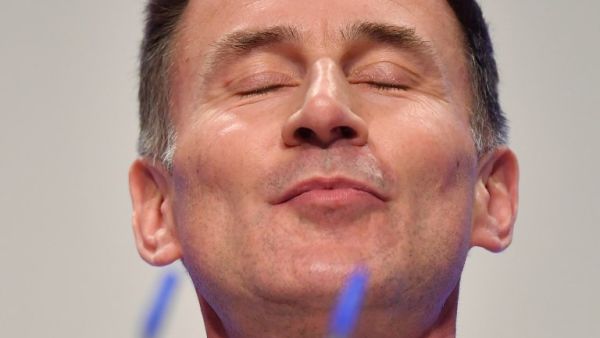 Britain's Foreign Secretary Jeremy Hunt gives a speech in the main hall on the first day of the Conservative Party Conference 2018 at the International Convention Centre in Birmingham, on September 30, 2018. 
Ben STANSALL / AFP