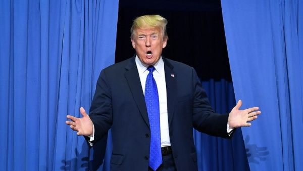 US President Donald Trump arrives at a "Make America Great Again" rally at Landers Center in Southaven, Mississippi, on October 2, 2018. 
MANDEL NGAN / AFP