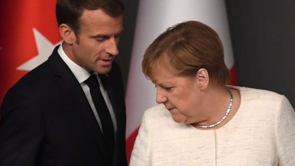 French President Emmanuel Macron (L) and German Chancellor Angela Merkel (AFP)