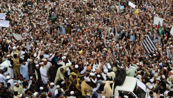 Supporters of Pakistan's religious hardline party Jamiat Ulema Islam (JUI) march during a protest rally following the Supreme Court's decision to acquit Pakistani Christian woman Asia Bibi of blasphemy. ()