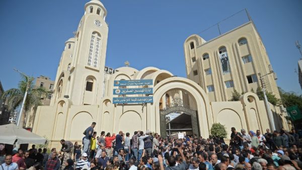 Coptic Christians carry the coffins of victims killed in an attack a day earlier,following a morning ceremony at the Prince Tadros church in Egypt's southern Minya province, on November 3, 2018. (MOHAMED EL-SHAHED / AFP)