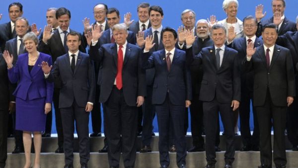 Participants of the G20 Leaders' Summit in Buenos Aires, pose for a family photo on November 30, 2018. Global leaders gather in the Argentine capital for a two-day G20 summit likely to be dominated by simmering international tensions over trade.
JUAN MABROMATA / AFP
