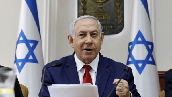 Israeli Prime Minister Benjamin Netanyahu opens the weekly cabinet meeting at his Jerusalem office on January 6, 2019. (AFP/File)