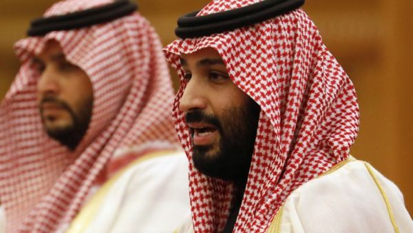 Saudi Crown Prince Mohammed bin Salman (R) attends a meeting with Chinese President Xi Jinping at the Great Hall of the People in Beijing on February 22, 2019. (AFP)