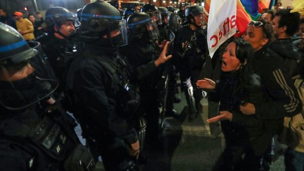 French gendarmes stand guard in front of people as they gather in the city of Nice on March 25, 2019. (AFP/ File Photo)